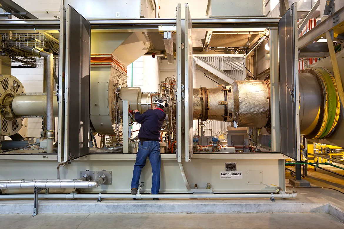Engineer inspecting Boiler machinery.